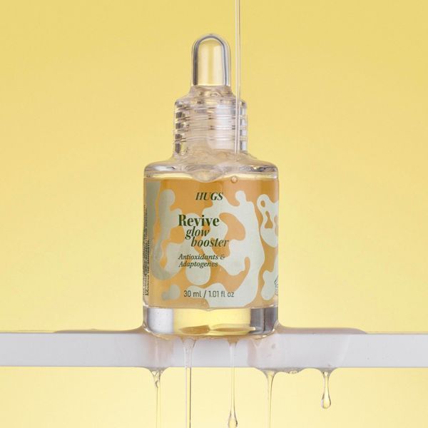 Антиоксидантна сироватка з вітаміном С HUGS Revive Glow Booster 5 мл cos1044 фото